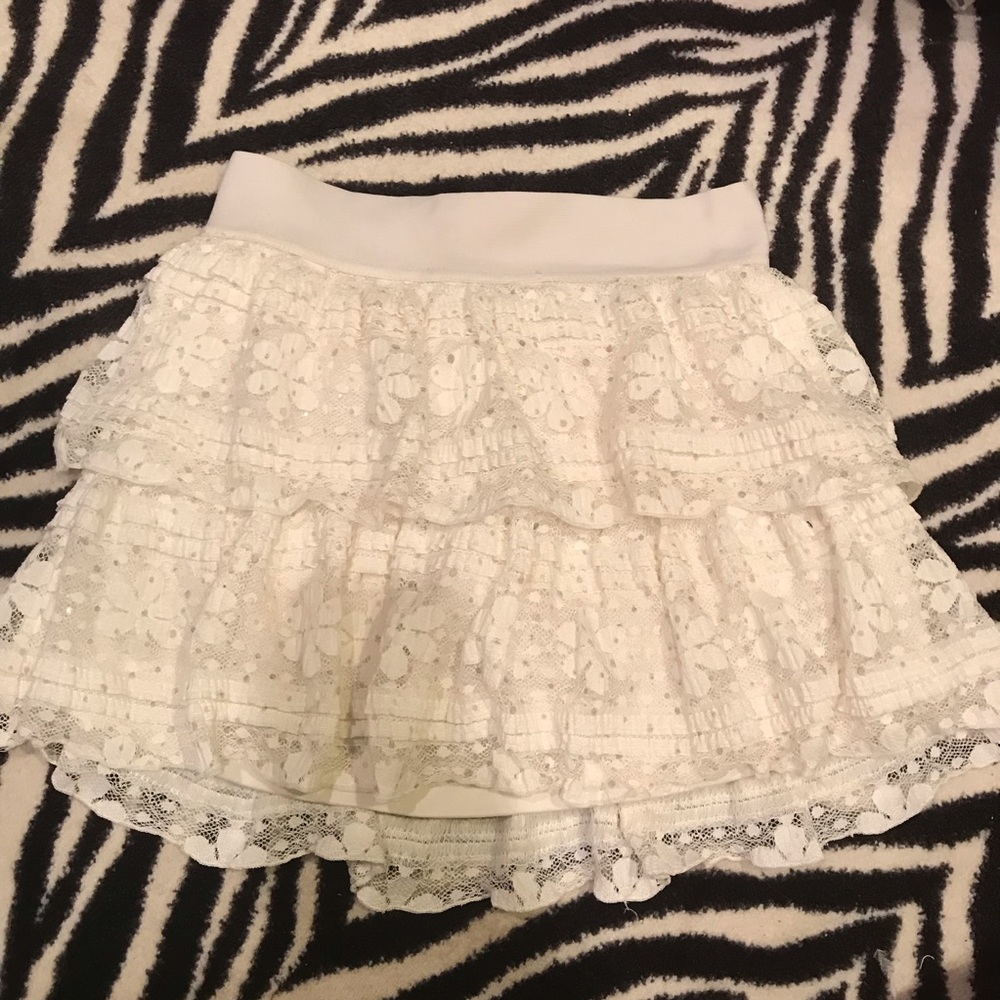 White ruffled skirt